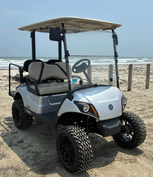 Silver Yamaha 4-passenger cart for On the Beach RV park guests